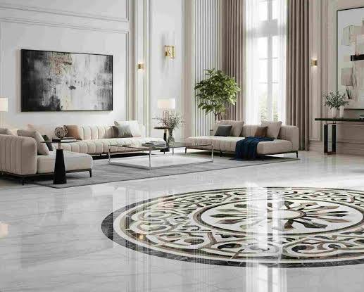 Contemporary living room with large windows at Kalpataru Amare Juhu